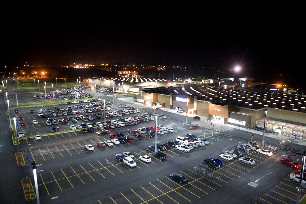 Walmart has implemented LED lighting in their stores and parking lots. 