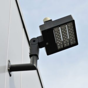 LED lighting mounted on a building and aimed at the parking lot