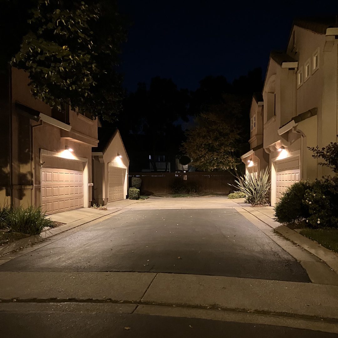 2200 Kelvin LED wall packs illuminate an HOA driveway